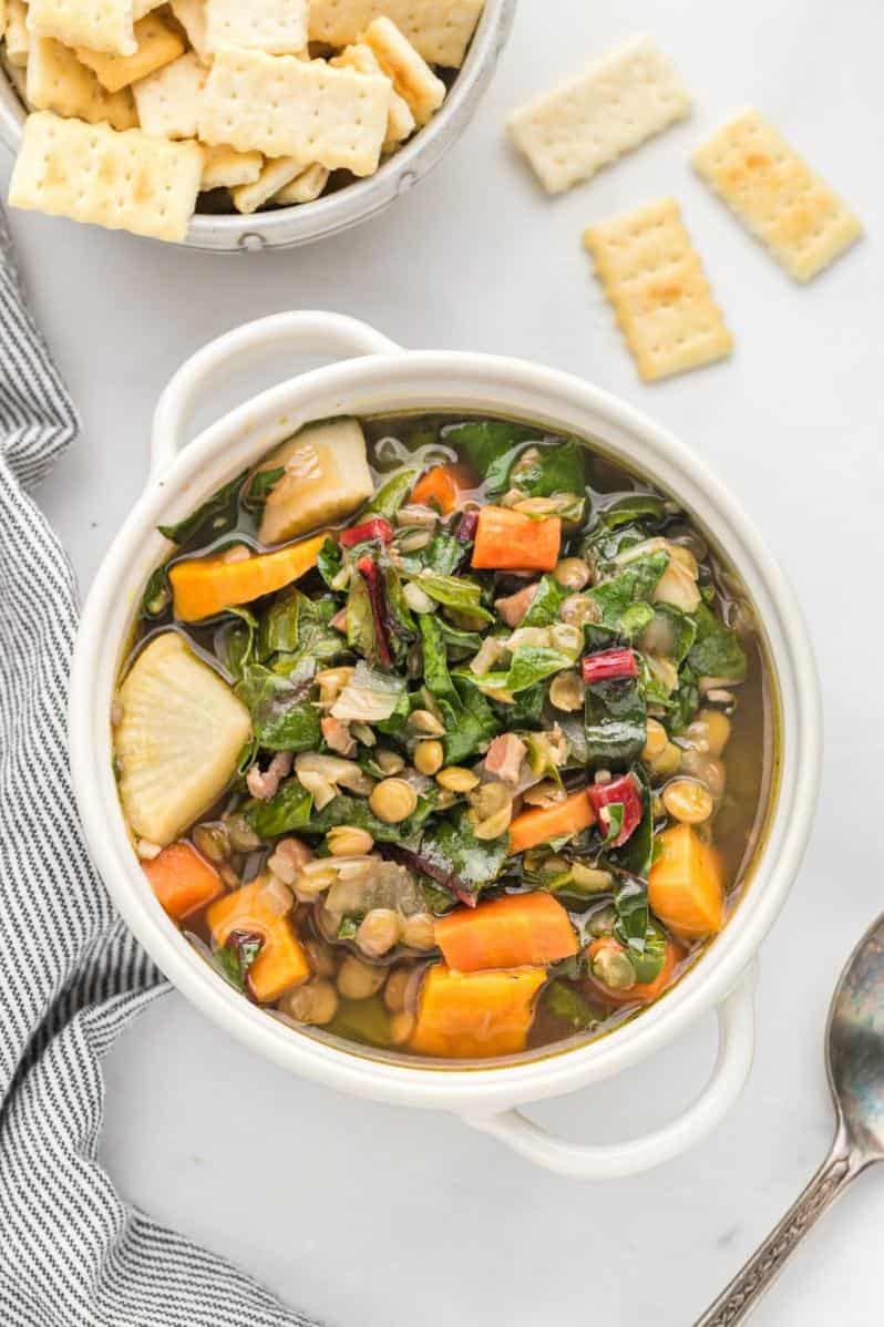  A hearty bowl of winter warmth with squash, parsnips, and lentils.