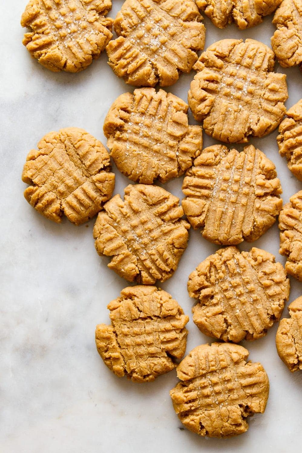  A heavenly aroma of fresh-baked peanut butter cookies wafts through the kitchen, inviting you to indulge in their scrumptiousness.
