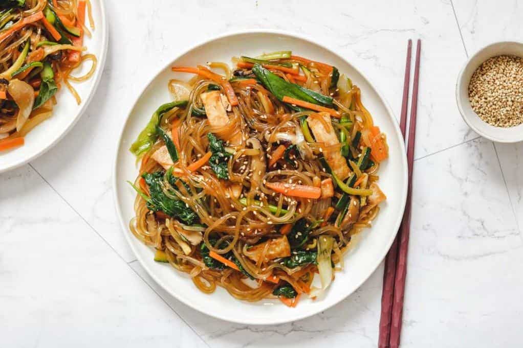  A rainbow of vegetables and shirataki noodles create a feast for the eyes in this vegan rendition of japchae.