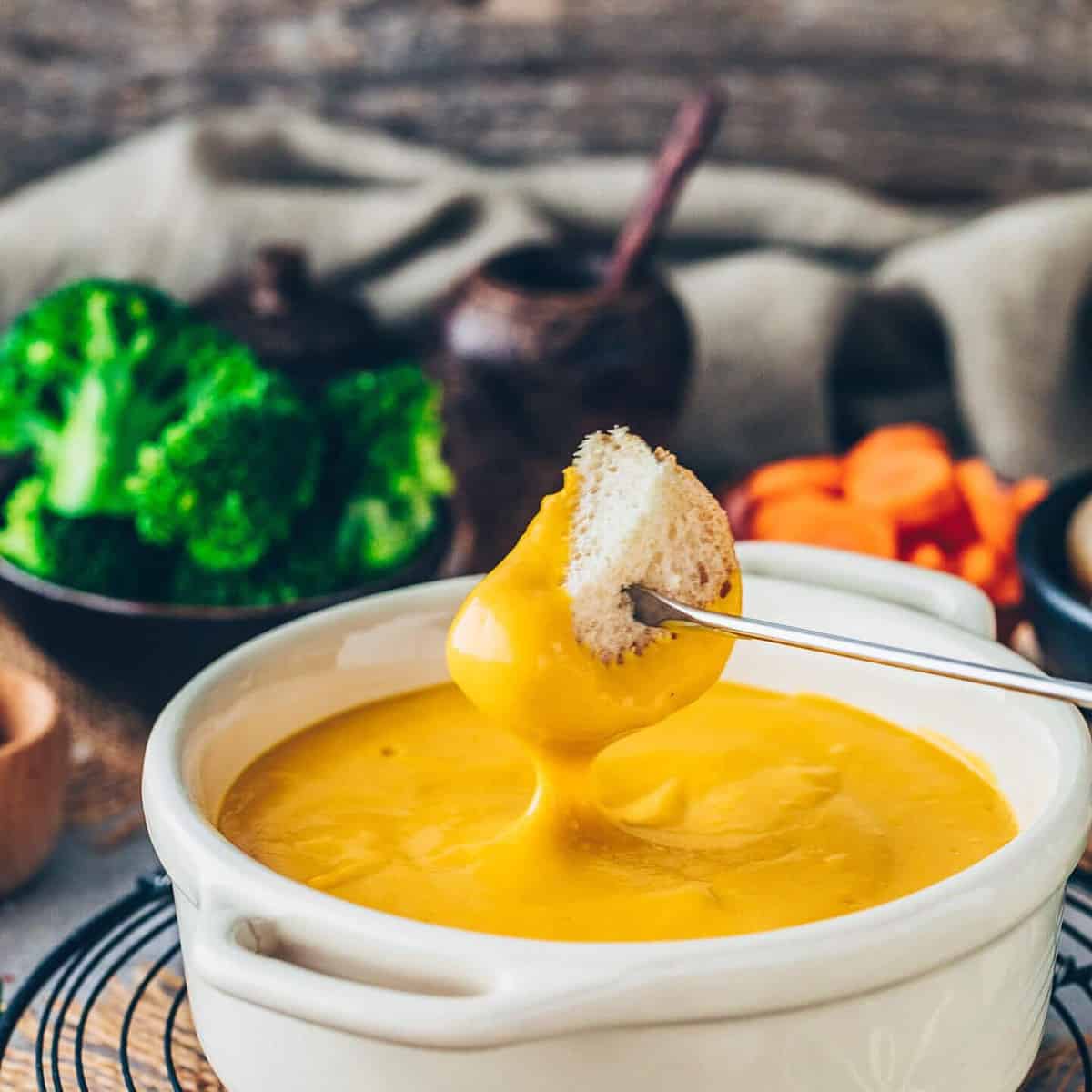  A warm and gooey bowl of vegan cheese fondue