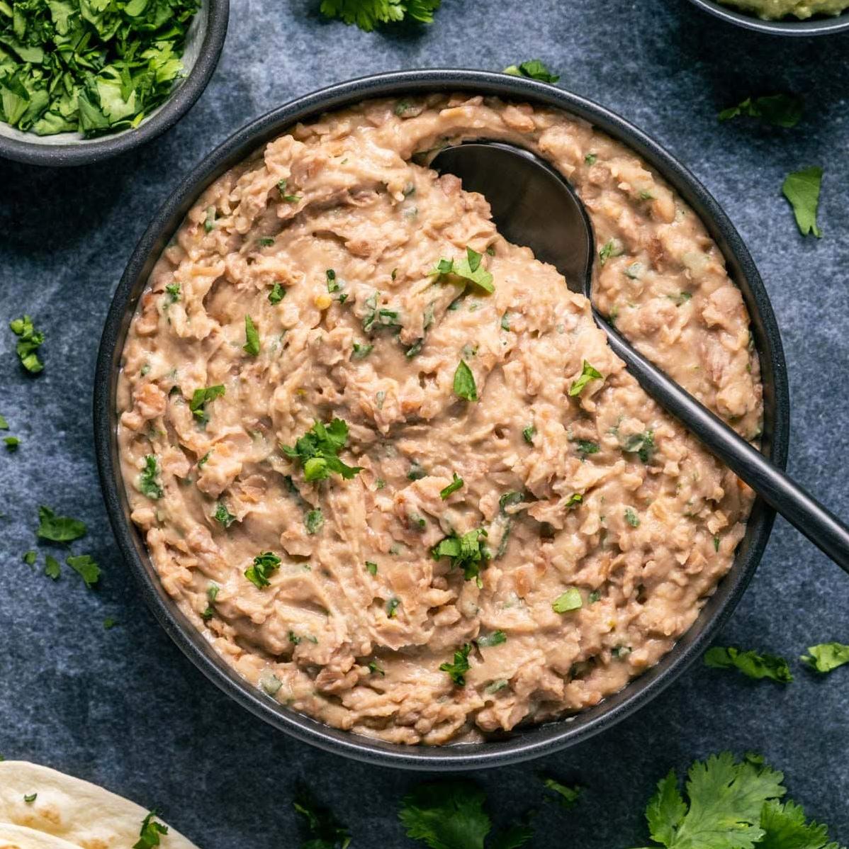  Enjoy a plant-based twist on a traditional Mexican staple with these vegan refried beans.