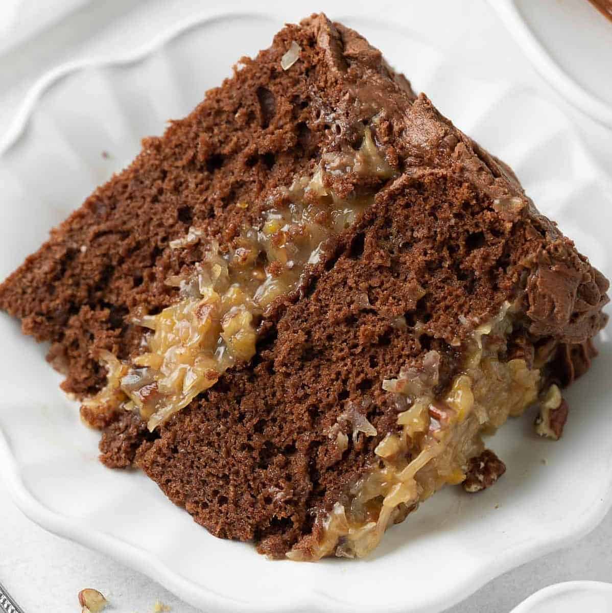  Indulge in this divine vegan German Chocolate Cake topped with a luscious coconut-pecan frosting!