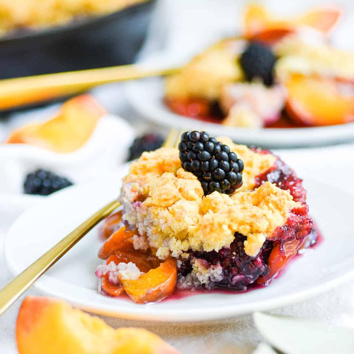  It's hard to resist digging into this dessert when the aroma of baked peaches and blackberries fills the air.