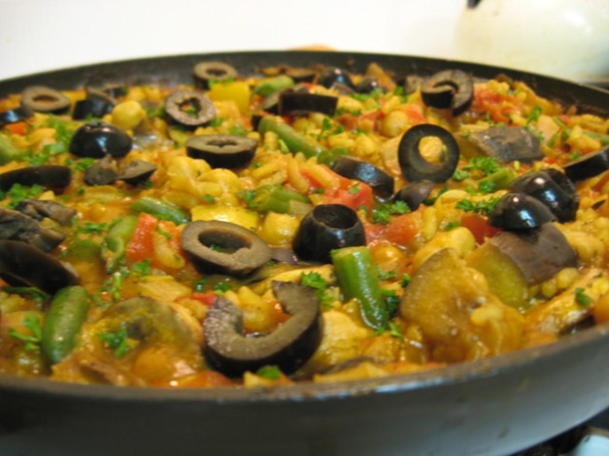  Our vegetarian paella brings the fiesta to your plate!