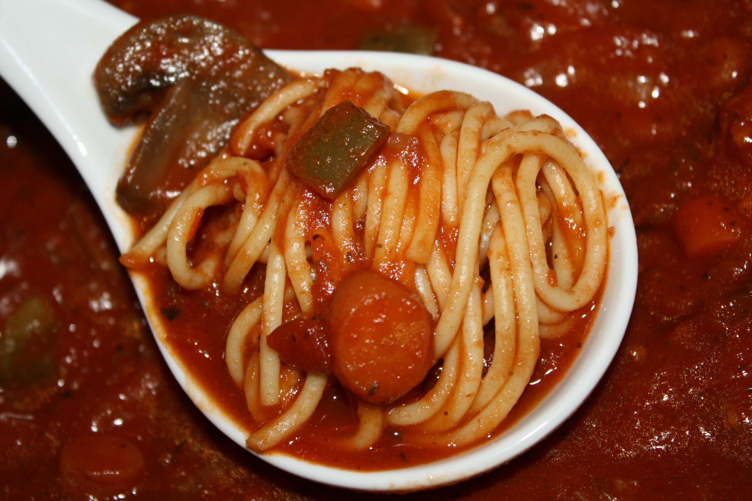  Perfectly cooked pasta, smothered in a warm, hearty sauce, ready to comfort you at the end of a long day.