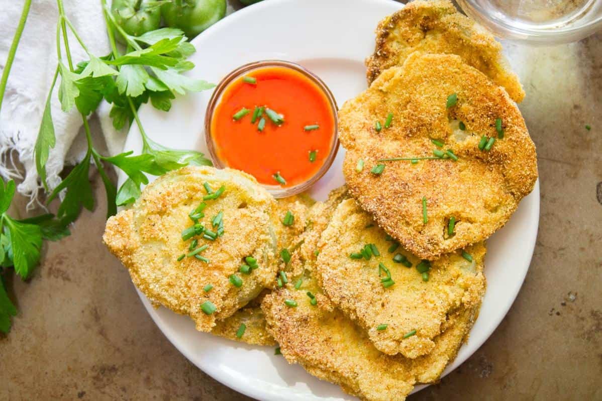  Preferably plucked from your backyard garden, these fried green tomatoes are a must-try during tomato season.