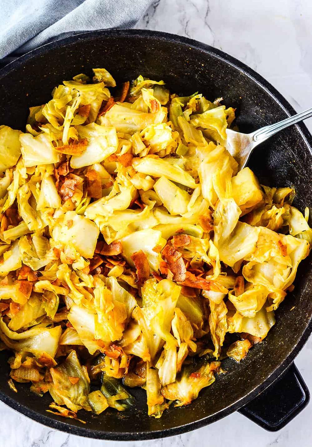  Spiced to perfection, this smothered cabbage is a vegan feast for the senses.