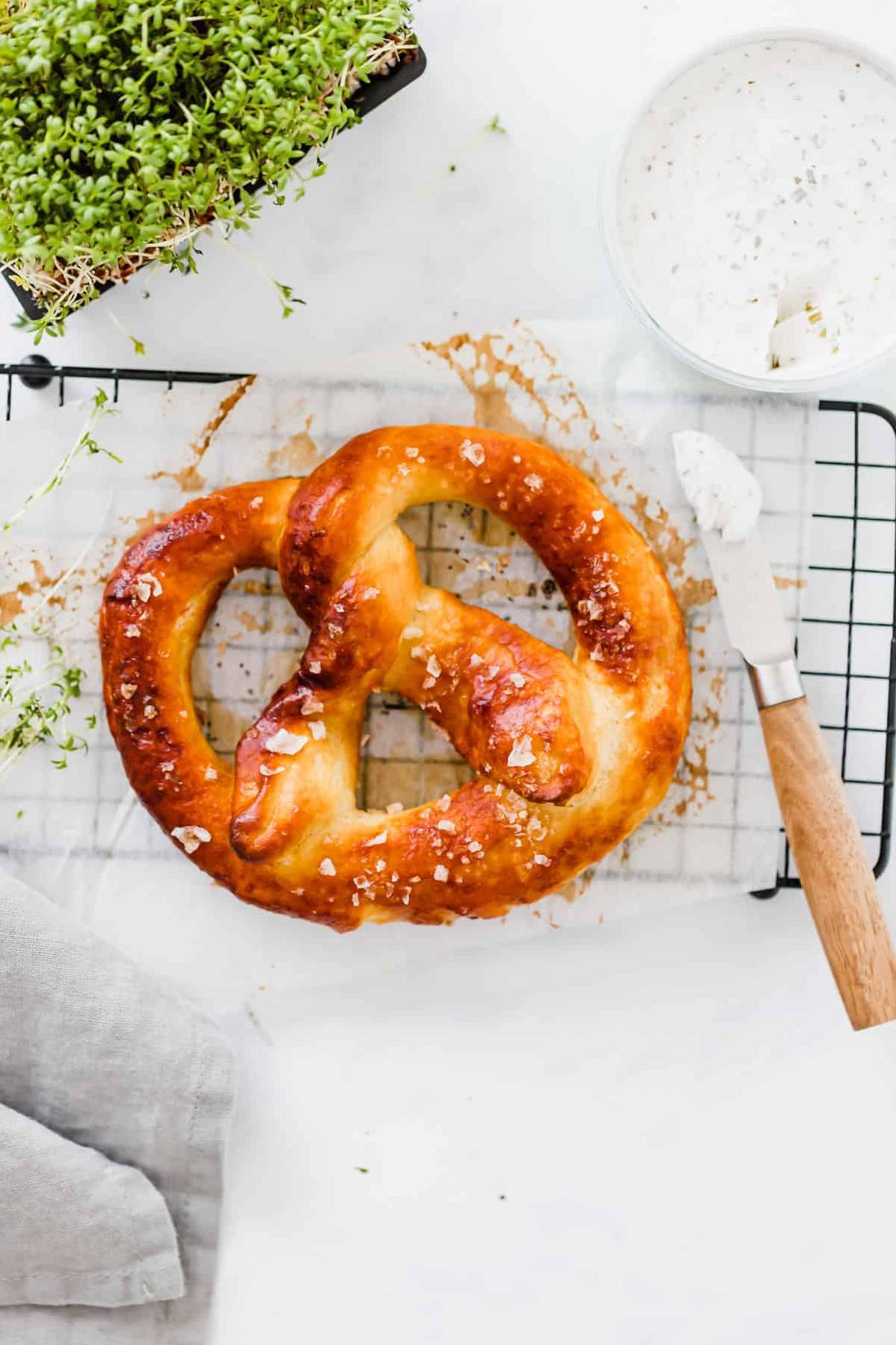  The key to that perfect pretzel texture is a quick trip in a baking soda bath, which gives them that shiny, crispy exterior we all know and love.
