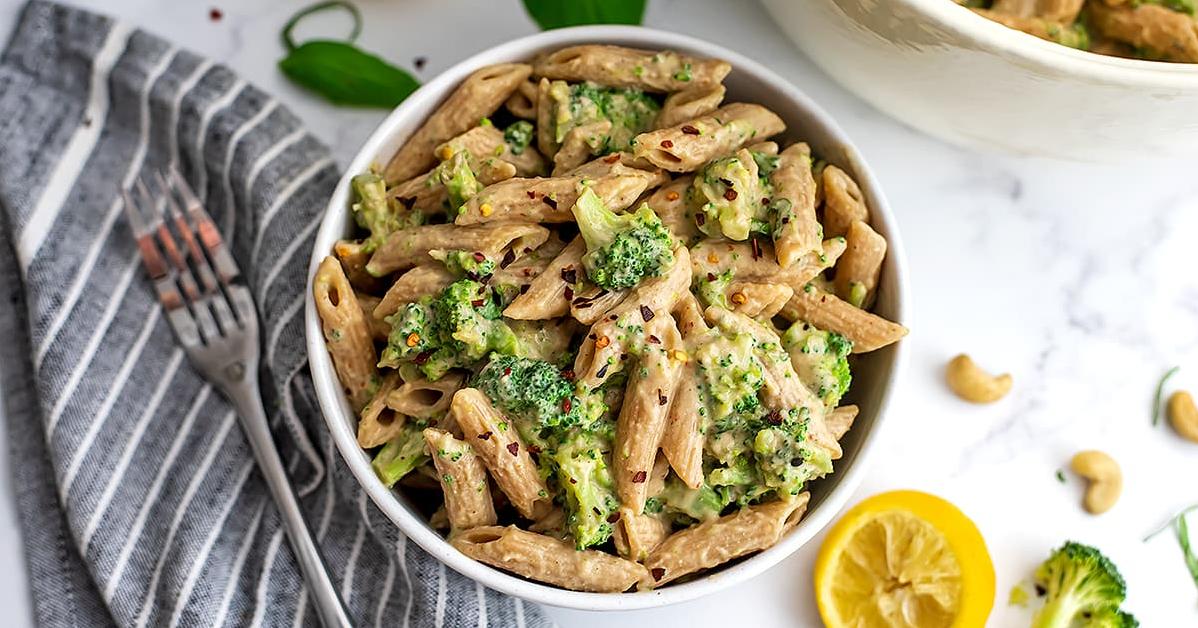  The vibrant green broccoli florets add a pop of color to this penne and chickpea sauce pasta.