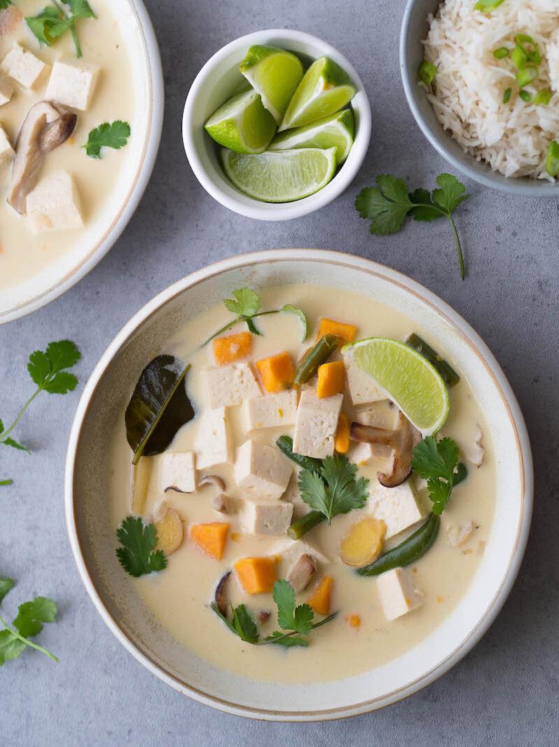  Tofu, mushrooms, and coconut milk blend together to create a heavenly soup that will warm you up on chilly evenings.
