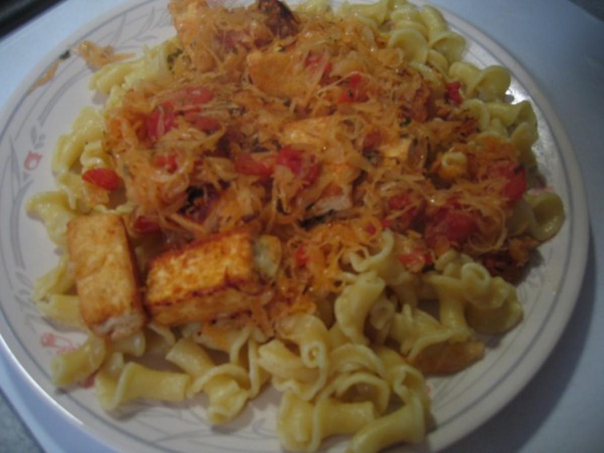  Twirl your fork into this tangy sauerkraut and tomato pasta dish!