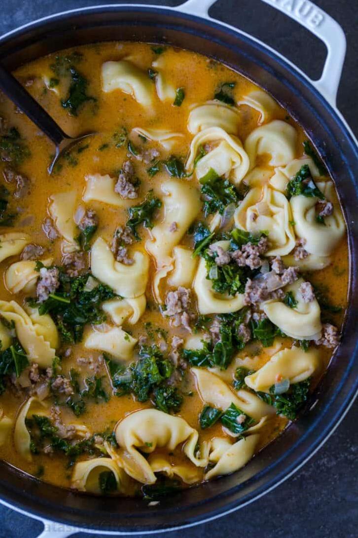  With fresh vegetables and hearty tortellini, this soup makes for a filling meal.